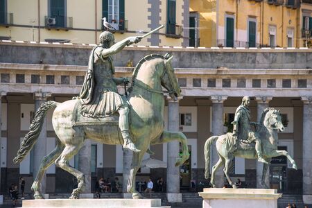 Naples, Italy - september 15, 2018: two equestrian monuments - Charles III (sculptor - Antonio Canova) and Ferdinand I (Antonio Cali) at the Plebiscito Square ( Piazza del Plebiscito ), citys main square, Naples, Italyのeditorial素材