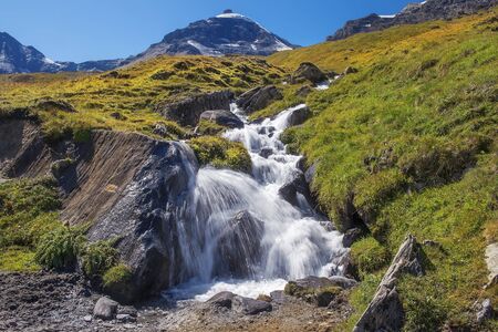 picturesque landscape with rapid mountain stream in the Swiss Alpsの写真素材