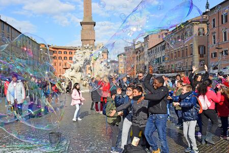 ROME, ITALY - January 16, 2019: performance with soap bubbles in Navona Square in Romeのeditorial素材