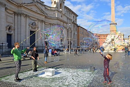 ROME, ITALY - January 16, 2019: performance with soap bubbles in Navona Square in Romeのeditorial素材