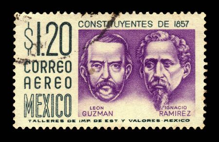MEXICO - CIRCA 1956: a stamp printed in Mexico shows Leon Guzman (1821-1884) and Ignacio Ramirez (1818-1879), were famous politicians of Mexico, circa 1956のeditorial素材