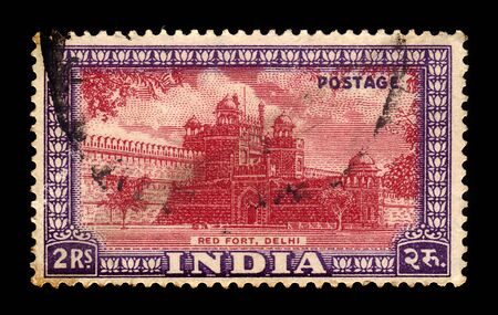 INDIA - CIRCA 1949: A stamp printed in India shows a Red Fort, historic fort in the city of Delhi in India, which served as the main residence of the Mughal Emperors, circa 1949のeditorial素材