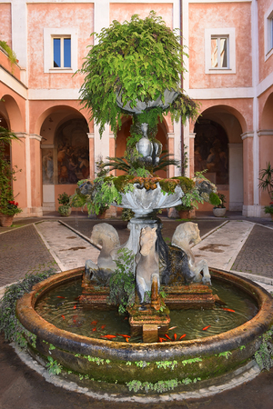 fountain at the Cloister in the Church of the Saints Cosma e Damiano in Romeのeditorial素材
