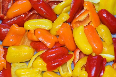bell peppers cut and prepared for preservesの写真素材