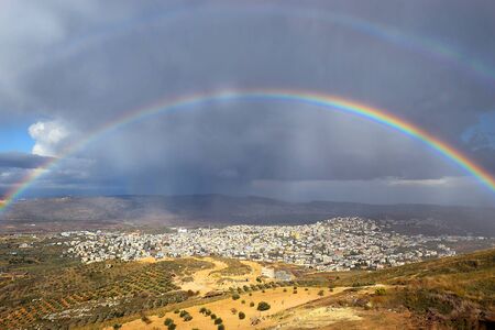 rainbow over Cana of Galilee after rain, Israelの写真素材