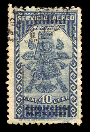 MEXICO - CIRCA 1935: a stamp printed in the Mexico shows antique statuette Aztec Bird Man, eagle warriors were a special class of infantry soldier in the Aztec army, circa 1935のeditorial素材