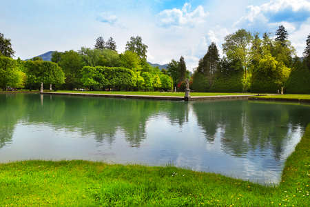 Salzburg, Austria - May 25, 2019 : pond with sculptures in the park of the Hellbrunn Palace - summer residence of the Archbishop of Salzburgのeditorial素材