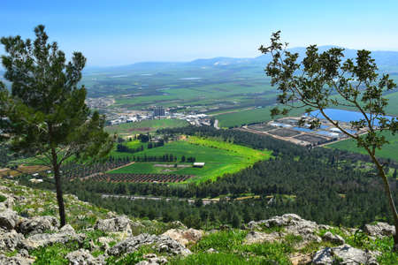 views of the Jezreel Valley from the heights of Mount Precipice, located just outside the southern edge of Nazareth, Lower Galilee, Israelの写真素材