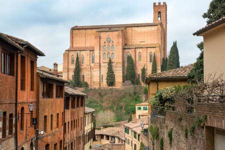 historic buildings and landmarks in magnificent medieval Siena, Tuscany, Italyの写真素材
