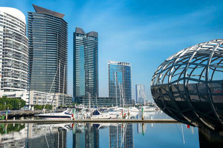 Webb Bridge and modern buildings in Docklands, Melbourneのeditorial素材