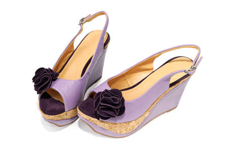 New female sandals on a high heels on white backgroundの写真素材