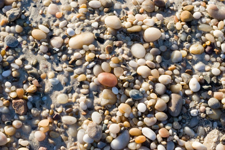 Background made of warm colors beach pebbles
