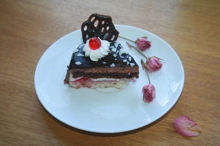 A slice of cake on the white plate.の写真素材