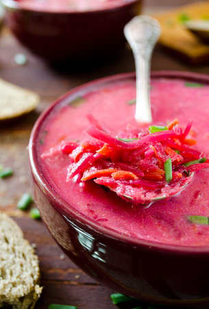 Traditional Ukrainian beetroot soup - red borsch with bean and garlic
