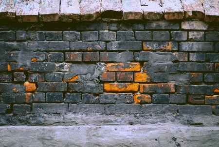 Old brick wall texture background, colorful and crackedの写真素材