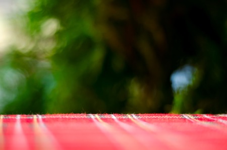 Empty red table and blur resturant background, street view, abstractの写真素材