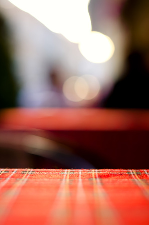 Empty red table and blur resturant background, street view, abstractの写真素材