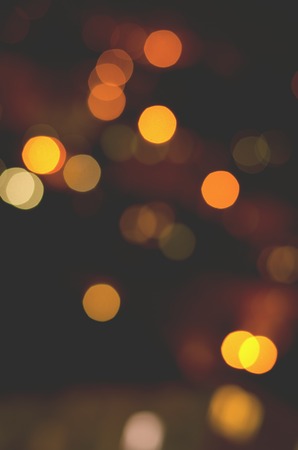 Christmas background. Festive abstract holidaysbackground with bokeh defocused lights and starsの写真素材