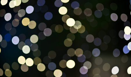 Christmas background. Festive abstract holidaysbackground with bokeh defocused lights and stars