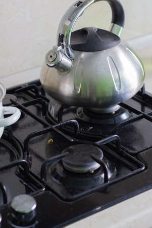 Dirty gas stove stained while cooking, a stove in grease. A mess in the houseの写真素材
