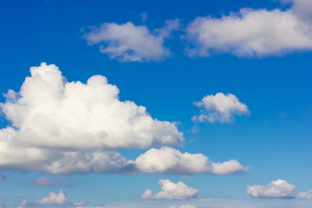 Blue sky background with clouds. Clouds on a clear day