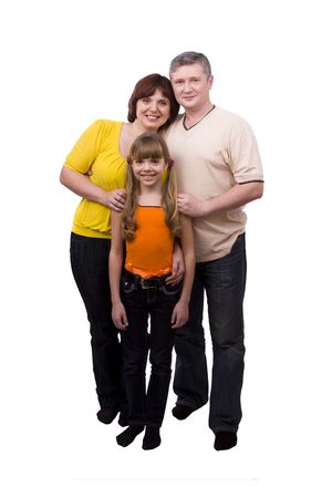 Whole-length portrait of happy family. Mother, father and little daughter are smiling. Woman, man and girl are lying on the floor and posing happily on white background.の写真素材