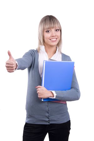 Young pretty girl make gesture ok. Student showing thumbs up on white background.  Woman looking into the camera while giving an ok gesture with her forward hand. の写真素材