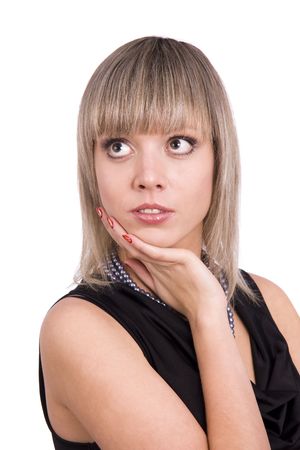 Portrait of fashion woman wearing black dress on the white background. Gorgeous model is in fashion and posing.の写真素材
