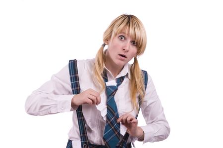High school student is hiding crib sheet in the uniform. High schoolgirl is trying to cheat on the test.  Young female student is going to use cheat using it during math exam.の写真素材