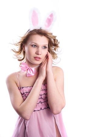 Woman wearing fancy dress on Halloween. A young female dressed up as rabbit Cute girl in sexy playboy costume on white backgrounds.の写真素材