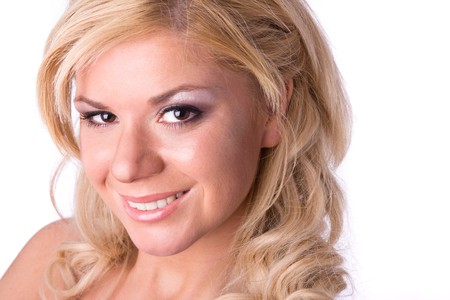 Portrait of beautiful young woman. Beautiful blonde is looking into the camera.の写真素材
