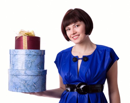 Young woman holding several bags. Excited Shopping Woman isolated on whiteの写真素材