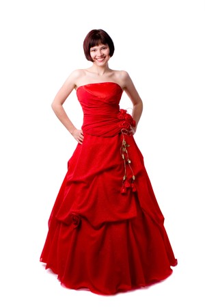 Beautiful young woman in red long dress. Girl in red dress portrait. 
Happy woman in red prom dress.
の写真素材