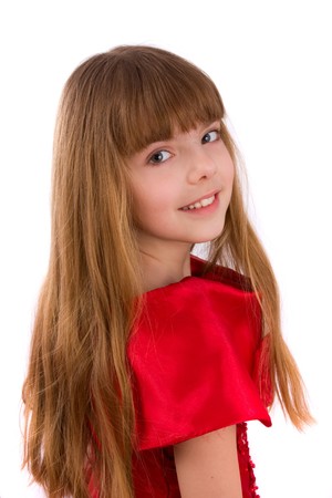 Close-up portrait of a beautiful blond girl. Little girl is wearing in red dress.の写真素材