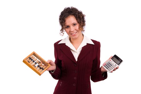 Portrait of a smiling business woman choice between  wooden abacus and calculator. Isolated over white background.の写真素材
