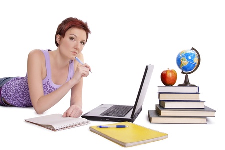 Girl doing her homeworkの写真素材