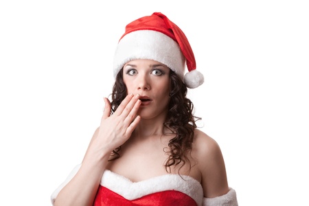 Santa girl is looking surprisedの写真素材
