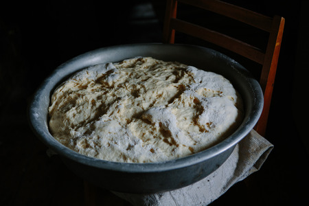 Making dough by female hands at homeの写真素材