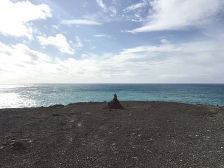 View to Ajuy coastline with vulcanic mountains on Fuerteventura island, Canary Islands, Spainの写真素材