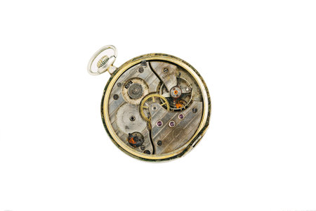 Clockwork details, pinions and wheels macro closeup isolated on white