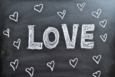 The word Love and hearts on a blackboard, backgroundの写真素材