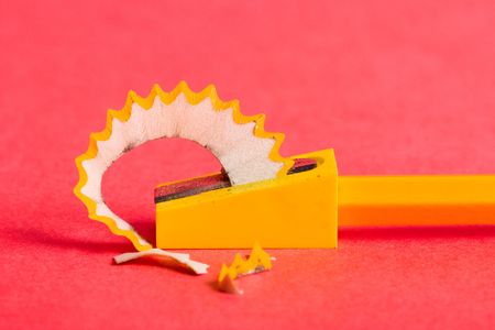 Pencil, pencil sharpener and shavingsの写真素材