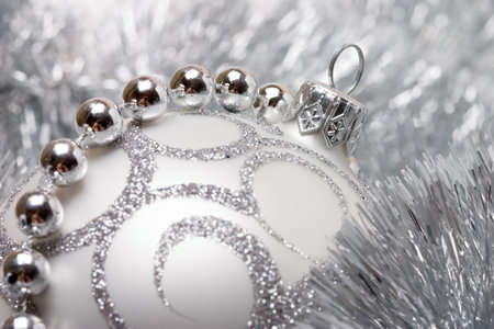 Christmas decoration on the silver tinsel backgroundの写真素材