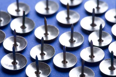 Drawing pin on blueの写真素材