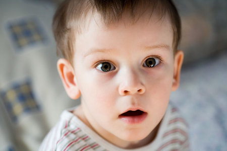 Portrait of a  Boy stare with wide-open eyesの写真素材
