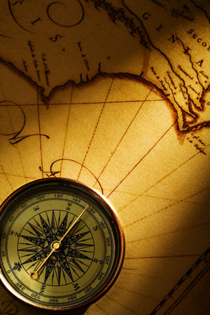 compass on old textured paper with copyspace