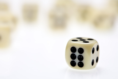 close up view of three dice on whiteの写真素材