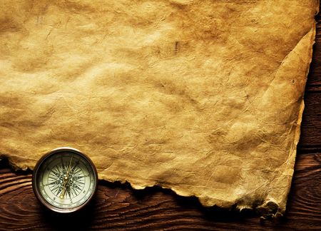 Close up view of the Compass on the old paper backgroundの写真素材