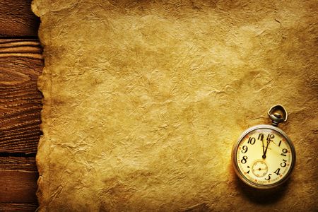 Close up view of the Pocket clock on old paperの写真素材