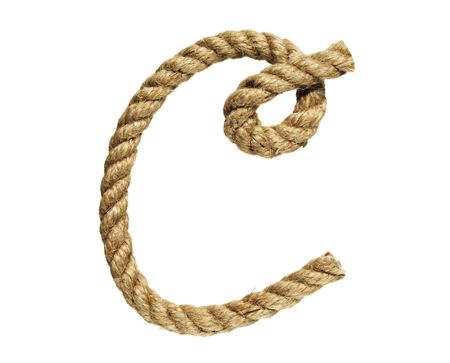 old natural fiber rope bent in the form of letter Cの写真素材